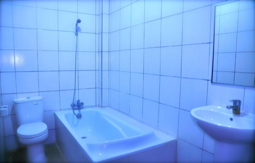 Si Doi Hotel Legian Кута Номер фото